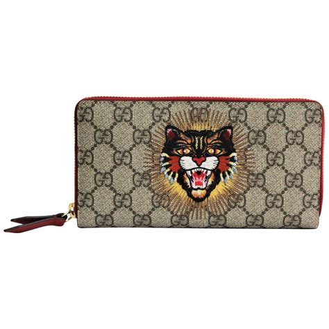 gucci mad cat wallet|GUCCI GG Supreme Monogram Angry Cat Zip Around Wallet.